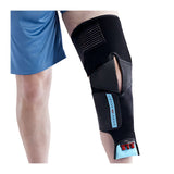 Game Ready knee wrap opened on the leg, side view